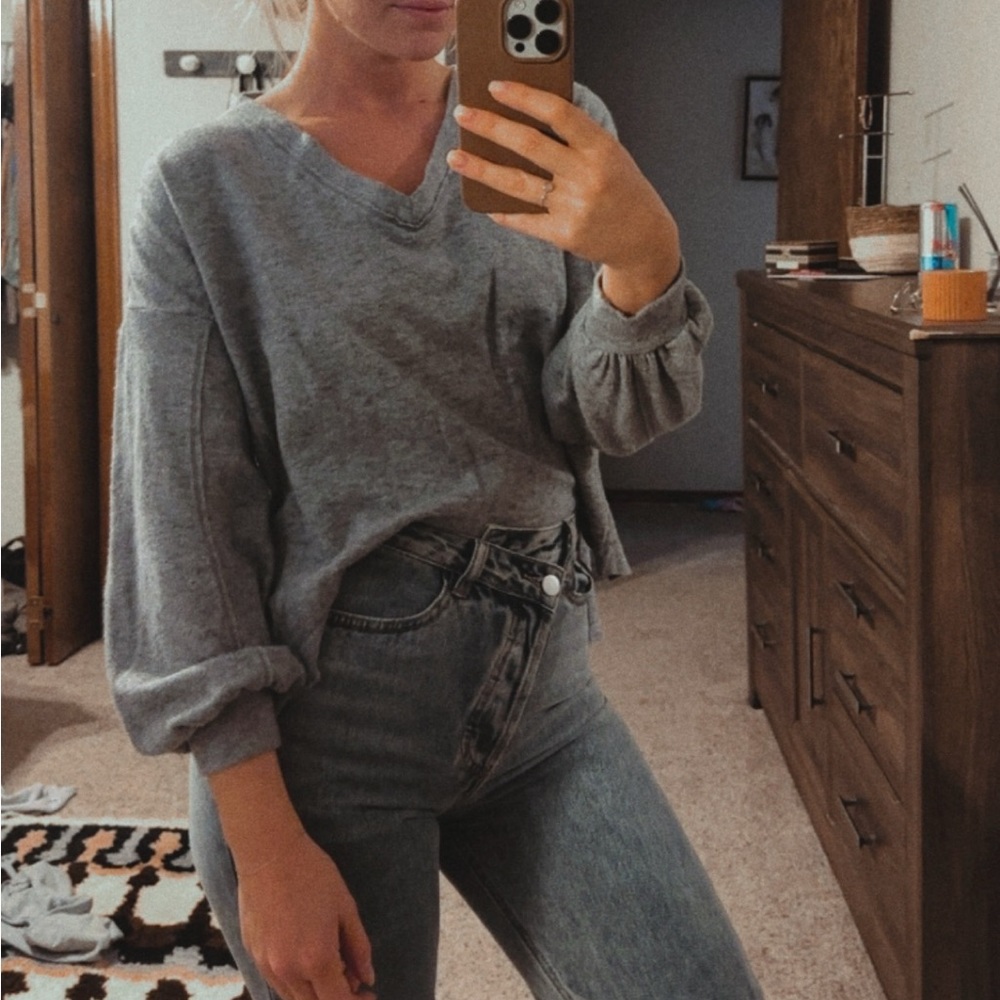 Gray sweater.